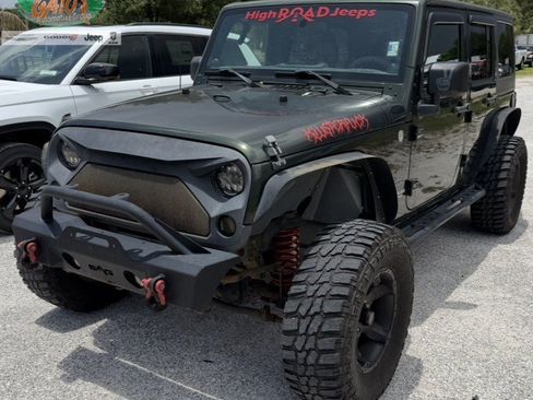 Used 2011 Jeep Wrangler Unlimited Sport AWD/4WD image 1