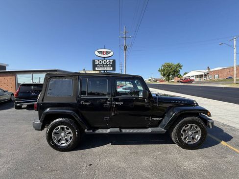 Used 2014 Jeep Wrangler Unlimited Rubicon w/ Dual Top Group AWD/4WD image 6