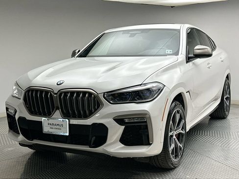 Used 2021 BMW X6 M50i w/ Executive Package AWD/4WD image 1