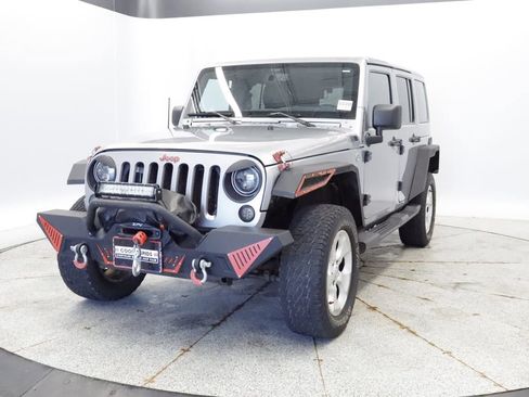 Used 2013 Jeep Wrangler Unlimited Sahara w/ Dual Top Group AWD/4WD image 1