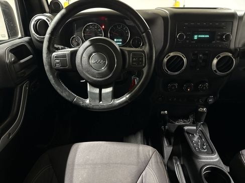 Used 2013 Jeep Wrangler Unlimited Sahara w/ Dual Top Group AWD/4WD image 11