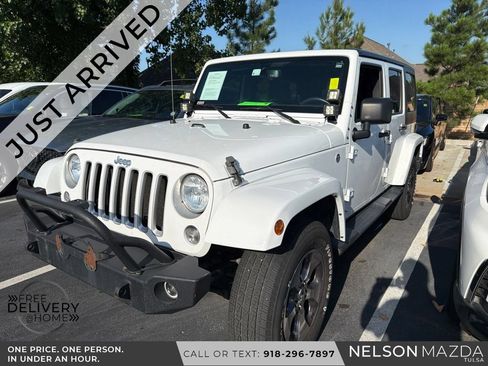 Used 2016 Jeep Wrangler Unlimited Sahara AWD/4WD image 1