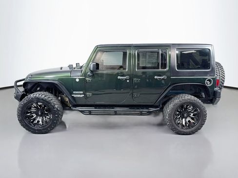 Used 2012 Jeep Wrangler Unlimited Sport w/ Connectivity Group AWD/4WD image 9