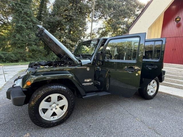 Used 2011 Jeep Wrangler Unlimited Sahara w/ Connectivity Group AWD/4WD image 2