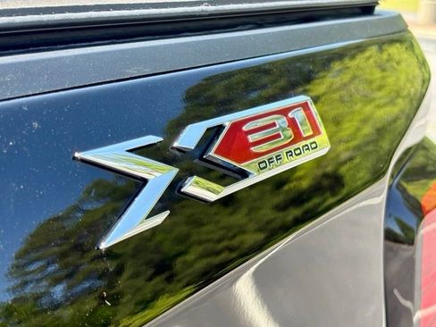 Used 2021 GMC Sierra 1500 SLT w/ SLT Premium Plus Package AWD/4WD image 16