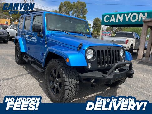 Used 2014 Jeep Wrangler Unlimited Sahara AWD/4WD image 1