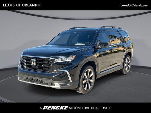 Used 2024 Honda Pilot Touring image 1