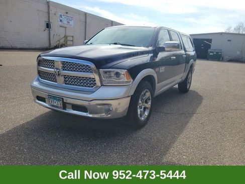 Used 2017 RAM 1500 Laramie AWD/4WD image 1