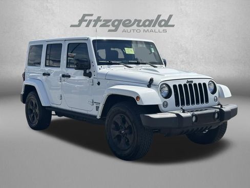 Used 2015 Jeep Wrangler Unlimited Sahara AWD/4WD image 1