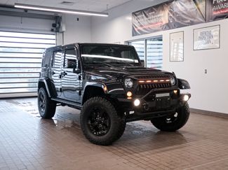 Used 2015 Jeep Wrangler Unlimited Sahara AWD/4WD video 2