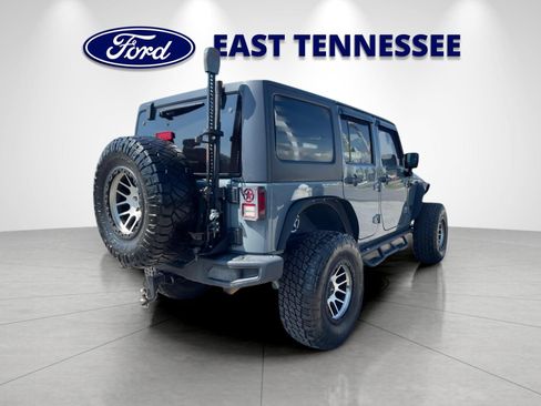Used 2014 Jeep Wrangler Unlimited Rubicon w/ Dual Top Group AWD/4WD image 3