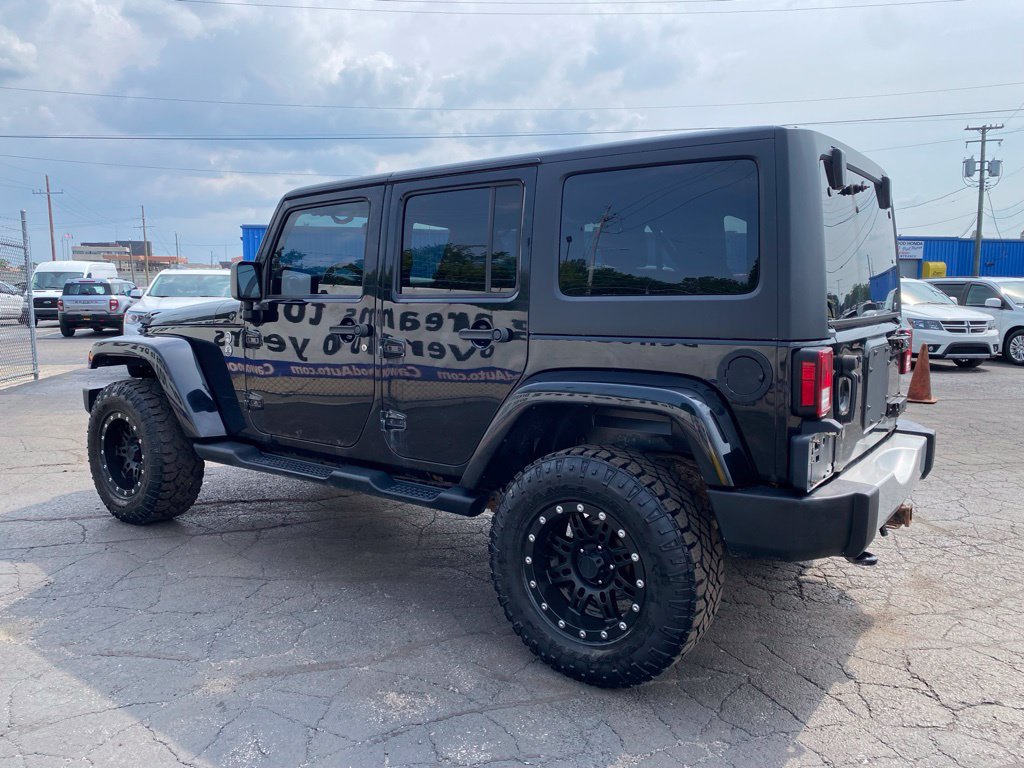 Used 2013 Jeep Wrangler Unlimited Sahara w/ Dual Top Group AWD/4WD image 6