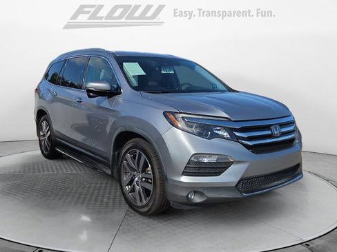 Used 2016 Honda Pilot Touring image 1