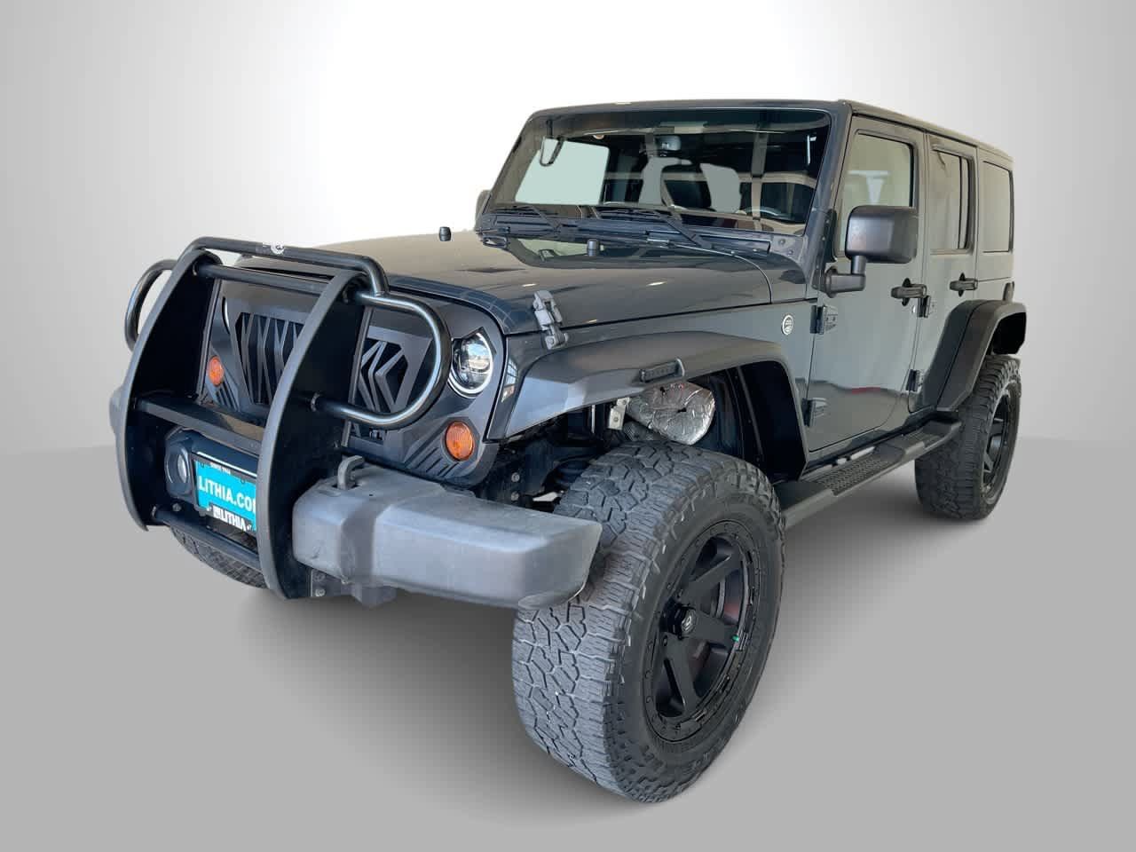 Used 2016 Jeep Wrangler Unlimited Sahara AWD/4WD image 1