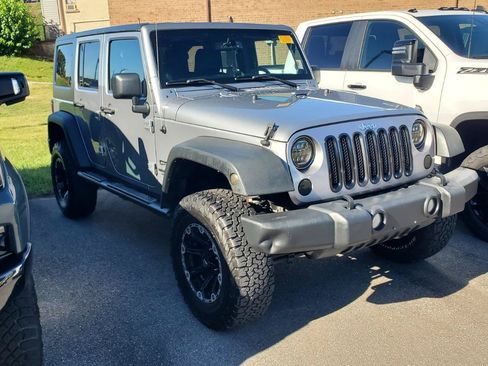 Used 2013 Jeep Wrangler Unlimited Sport AWD/4WD image 2