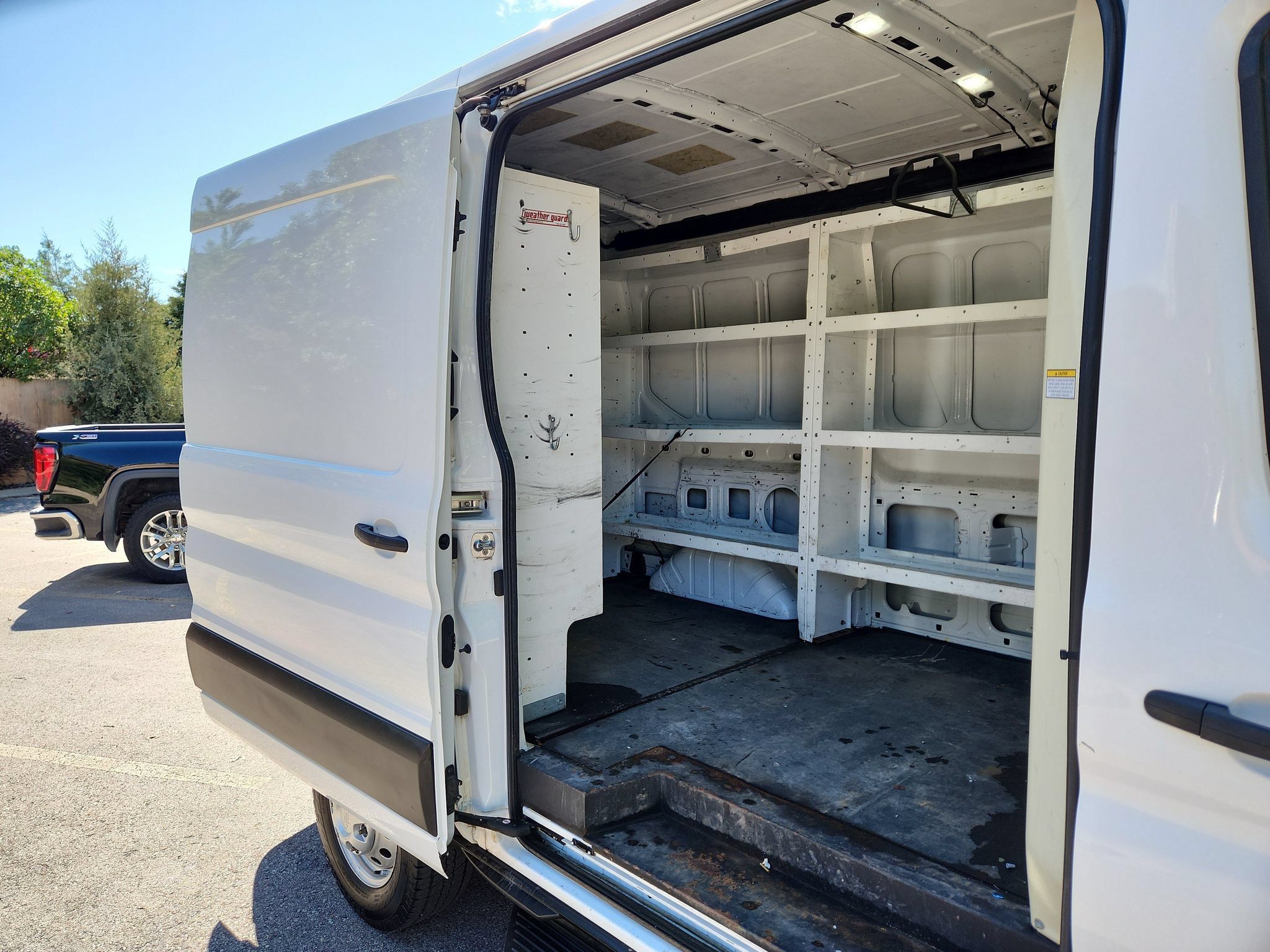 Used 2021 Ford Transit 150 Medium Roof AWD image 14