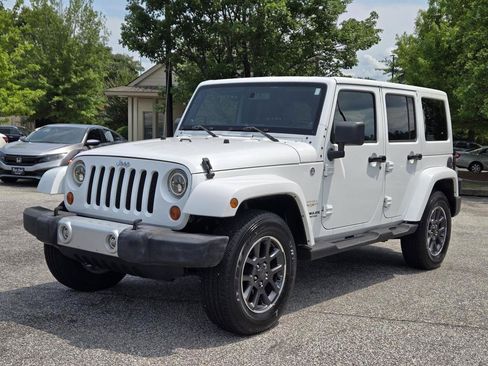 Used 2012 Jeep Wrangler Unlimited Sahara w/ Connectivity Group AWD/4WD image 1