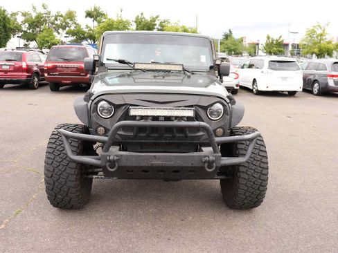 Used 2010 Jeep Wrangler Unlimited Rubicon w/ Dual Top Group AWD/4WD image 2