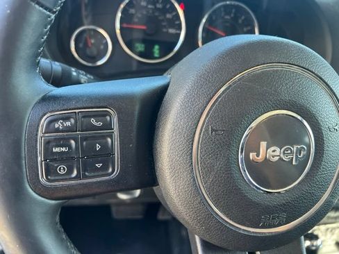 Used 2014 Jeep Wrangler Unlimited Sahara w/ Dual Top Group AWD/4WD image 21