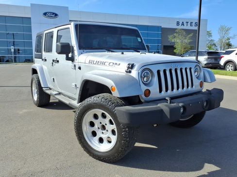 Used 2011 Jeep Wrangler Unlimited Rubicon w/ Dual Top Group image 1