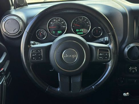 Used 2012 Jeep Wrangler Unlimited Sport AWD/4WD image 29