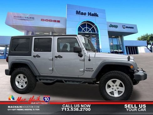 Used 2013 Jeep Wrangler Unlimited Sport image 1