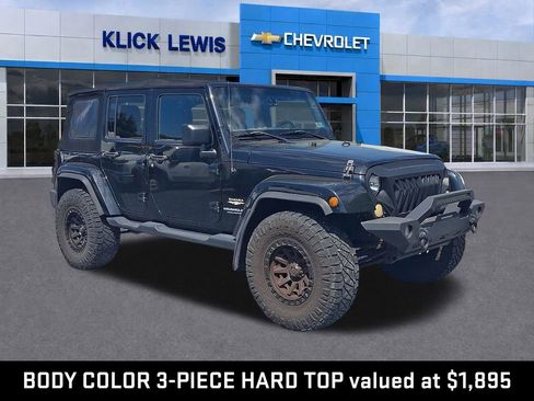 Used 2014 Jeep Wrangler Unlimited Sahara w/ Connectivity Group AWD/4WD image 1