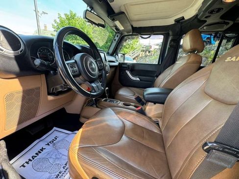 Used 2013 Jeep Wrangler Unlimited Sahara w/ Dual Top Group AWD/4WD image 15