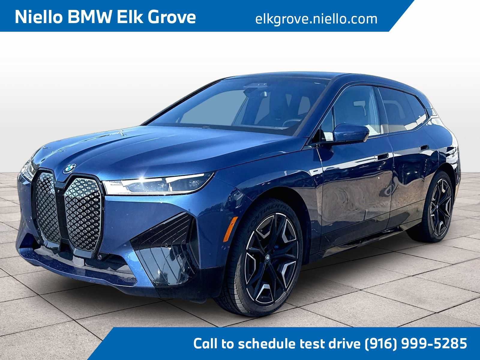Used 2024 BMW iX xDrive50 w/ Premium Package AWD/4WD image 1