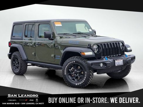 Certified 2023 Jeep Wrangler Unlimited w/ Cold Weather Group AWD/4WD image 1