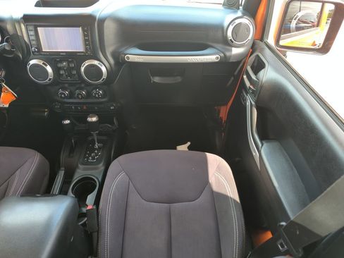 Used 2013 Jeep Wrangler Unlimited Sahara w/ Dual Top Group AWD/4WD image 16