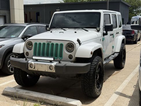 Used 2013 Jeep Wrangler Unlimited Sahara w/ Connectivity Group AWD/4WD image 1