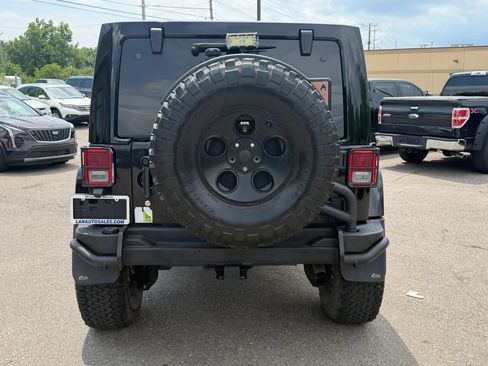 Used 2015 Jeep Wrangler Unlimited Rubicon w/ Dual Top Group AWD/4WD image 4