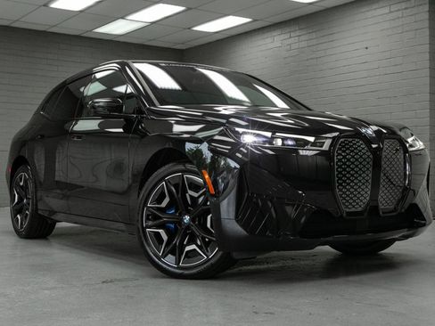 Used 2024 BMW iX xDrive50 w/ Premium Package AWD/4WD image 1