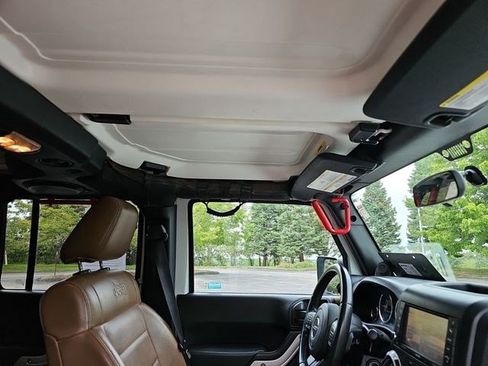 Used 2012 Jeep Wrangler Unlimited Sahara w/ Dual Top Group AWD/4WD image 12
