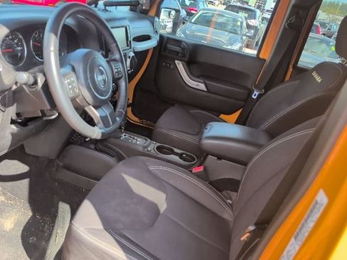 Used 2013 Jeep Wrangler Unlimited Sahara w/ Dual Top Group AWD/4WD image 11