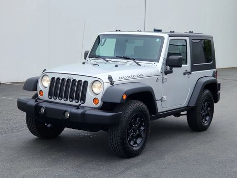 Used 2009 Jeep Wrangler Rubicon w/ Dual Top Group AWD/4WD image 1