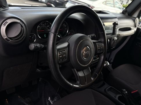 Used 2013 Jeep Wrangler Sport AWD/4WD image 16