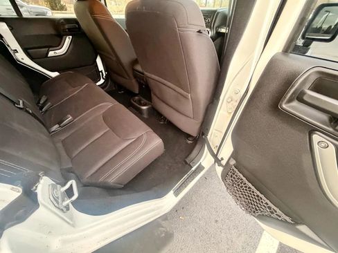 Used 2014 Jeep Wrangler Unlimited Sahara w/ Dual Top Group image 8