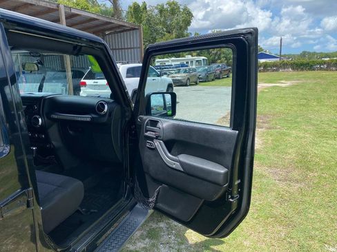 Used 2012 Jeep Wrangler Unlimited Sahara w/ Dual Top Group AWD/4WD image 22