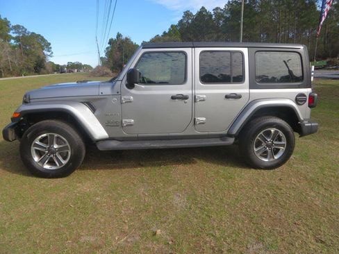 Used 2021 Jeep Wrangler Unlimited Sahara AWD/4WD image 1