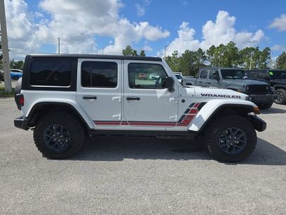 New 2026 Jeep Wrangler Unlimited Sport w/ Dual Top Group