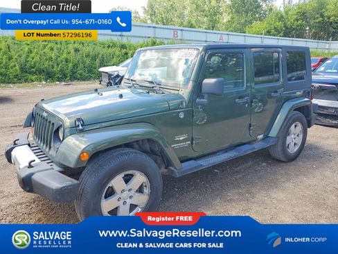 Used 2009 Jeep Wrangler Unlimited Sahara w/ Dual Top Group AWD/4WD image 1
