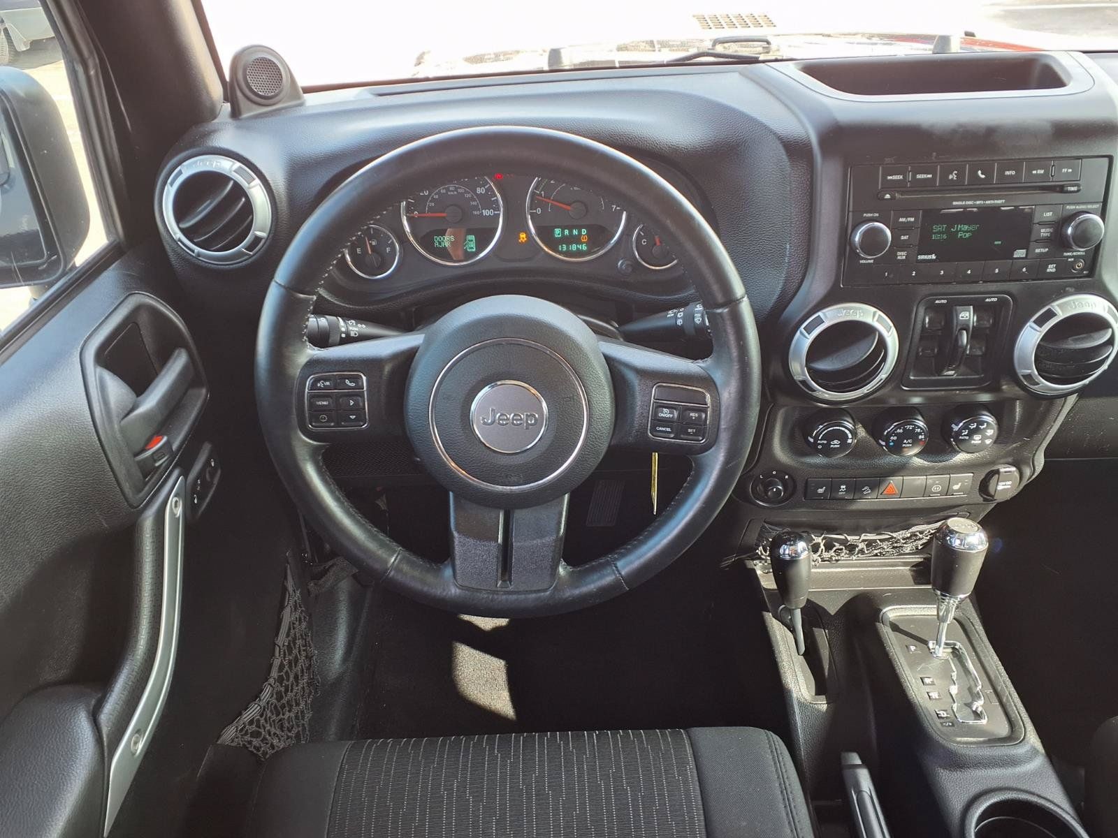 Used 2012 Jeep Wrangler Unlimited Sahara w/ Connectivity Group AWD/4WD image 12