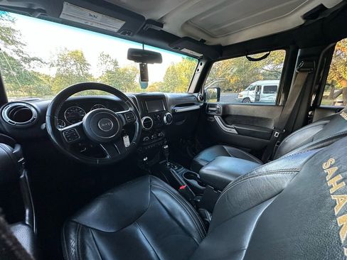 Used 2015 Jeep Wrangler Unlimited Sahara w/ Dual Top Group image 11