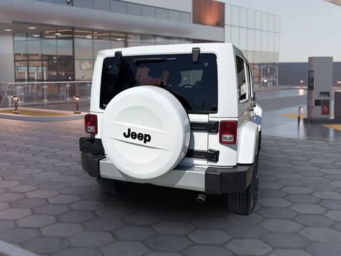 Used 2015 Jeep Wrangler Unlimited Sahara w/ Mopar Chrome Edition Group AWD/4WD image 12