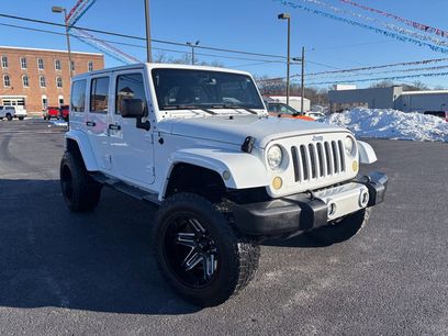 Used 2015 Jeep Wrangler Unlimited Sahara w/ Dual Top Group
