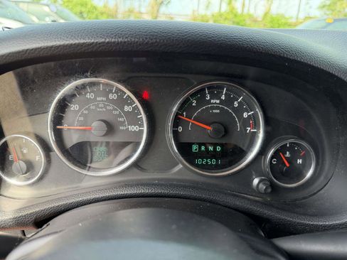 Used 2014 Jeep Wrangler Unlimited Sahara w/ Dual Top Group AWD/4WD image 22