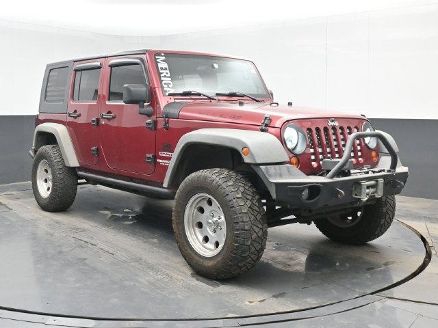 Used 2012 Jeep Wrangler Unlimited Sport w/ Max Tow Pkg AWD/4WD image 2