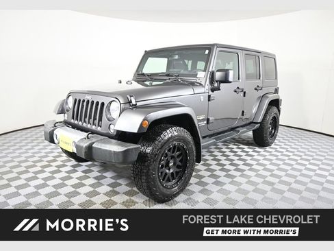 Used 2014 Jeep Wrangler Unlimited Sahara w/ Connectivity Group AWD/4WD image 1